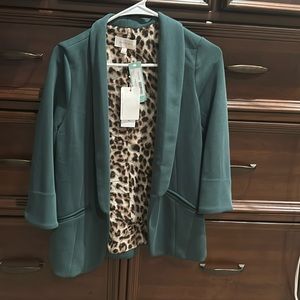 Skies are blue green blazer. New never worn
